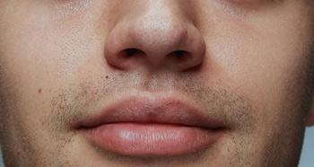 Man nose and lips close up