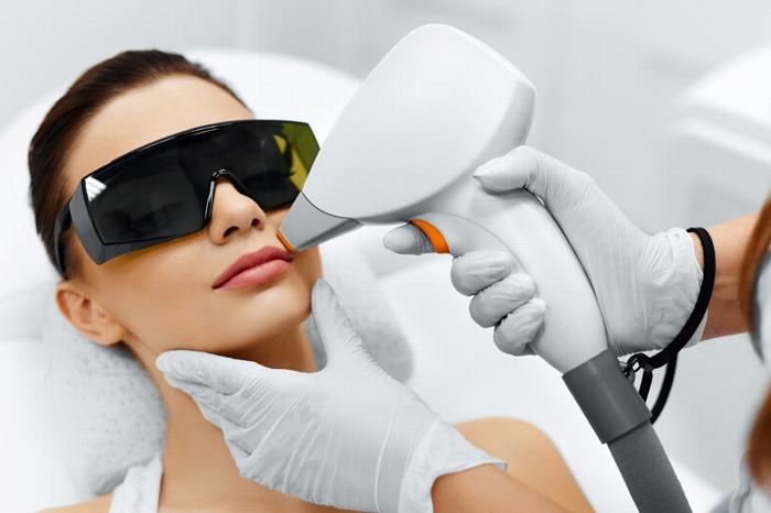 Woman getting laser hair removal